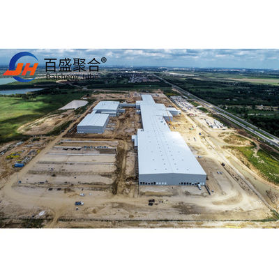 โรงงานโครงสร้างเหล็ก โกดังที่กําหนดเองที่มีรางหลังคายาวและกรอบเหล็กกระดาษ